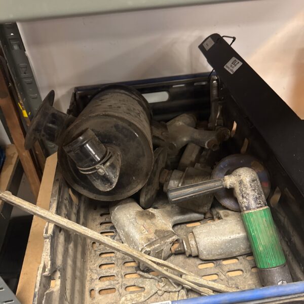 Selection of used pneumatic impact guns and air tools.