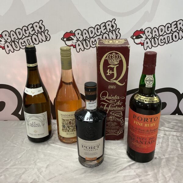 Collection of port wine bottles including Quinta do Infante and M&S.