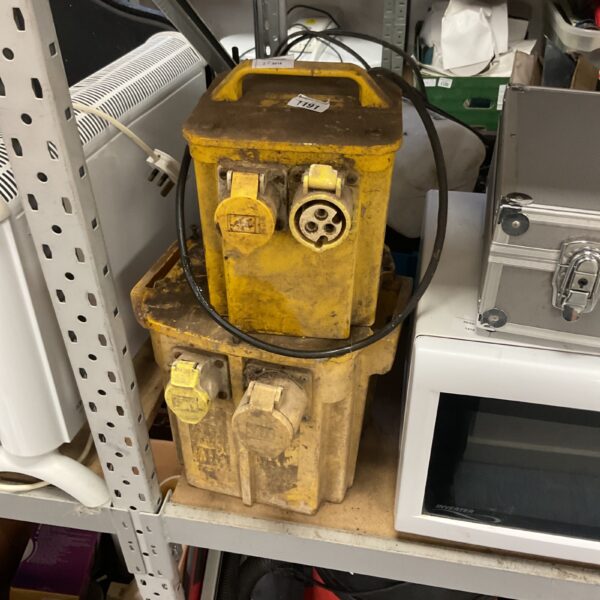 Yellow portable site transformer with multiple sockets.