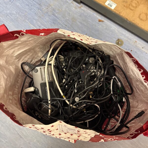 Assorted power leads and a One For All TV signal booster.