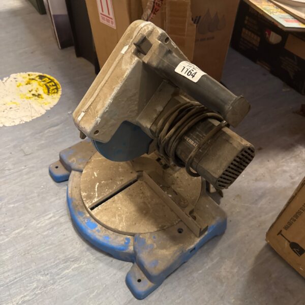 Vintage Powerbase electric mitre saw for woodworking projects.