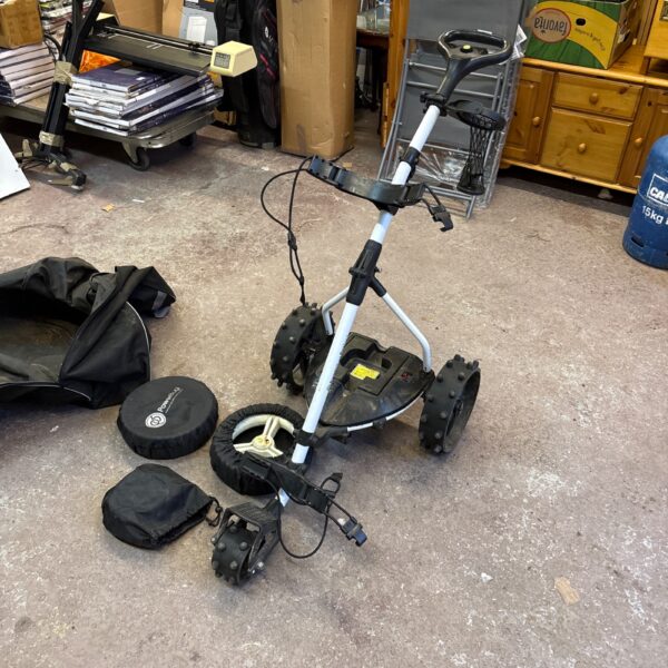 Used Powerbug ProTour electric golf trolley with spare wheels.