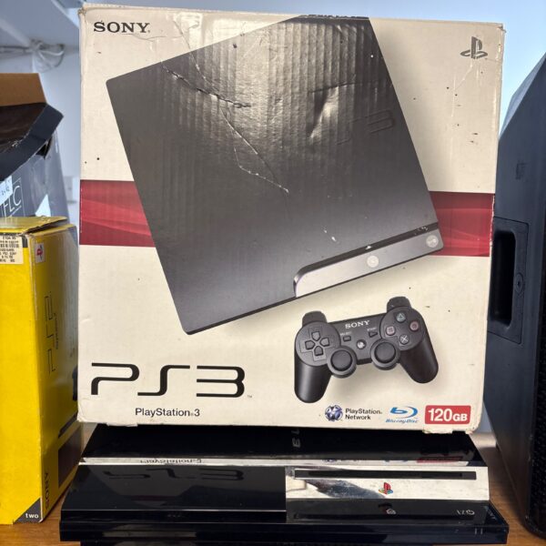 Sony PS3 Slim console in original box, retro gaming system.