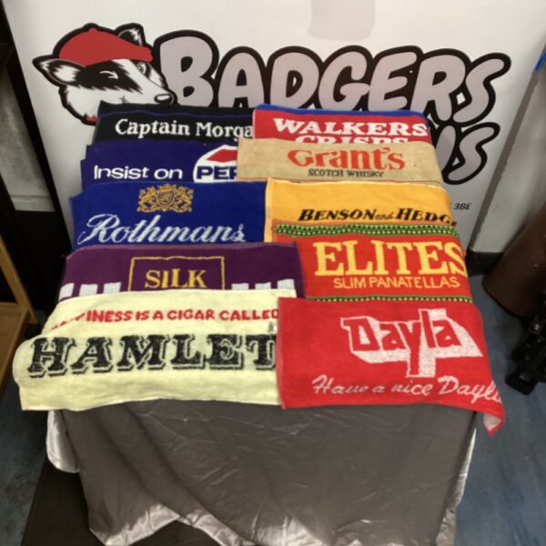 Vintage pub mats collection featuring Rothmans, Captain Morgan, and Pepsi.