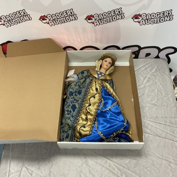 Anastasia Collection Queen Guinevere porcelain doll in blue gown.