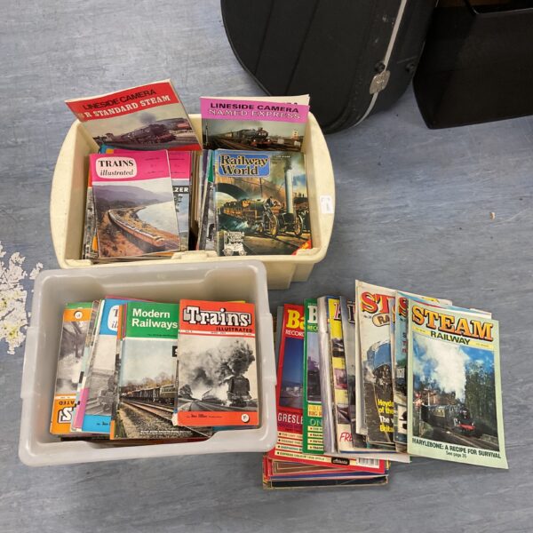 Vintage railway magazines featuring steam trains and railway history.