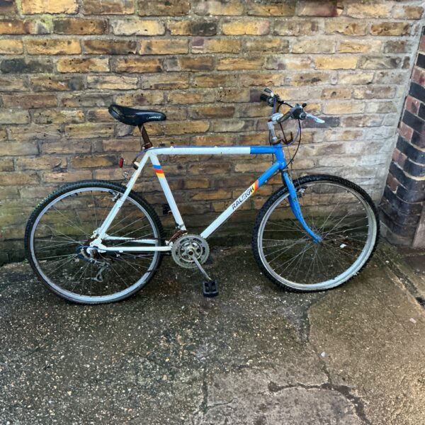 Vintage Raleigh mountain bike requiring repair and restoration.
