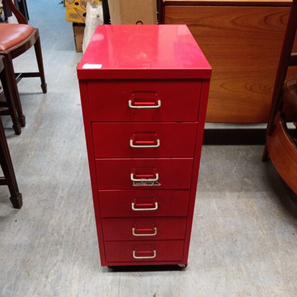 Vintage red metal draw unit for engineers or drafting.