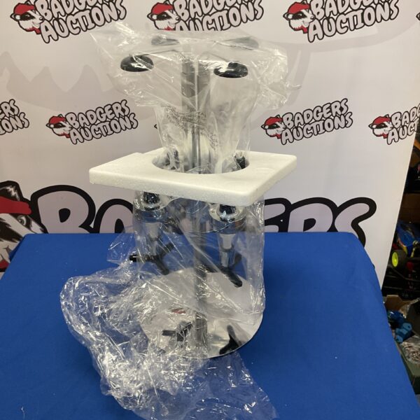 Chrome revolving bottle display stand for barware.
