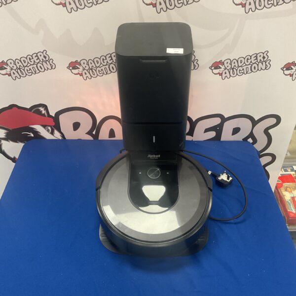 iRobot Roomba robotic vacuum cleaner on a docking station.