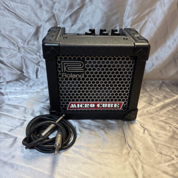 Vintage Roland Micro Cube guitar amplifier for practice and small gigs.