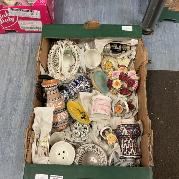 Vintage Royal Albert china ornaments with floral patterns displayed in a lot.