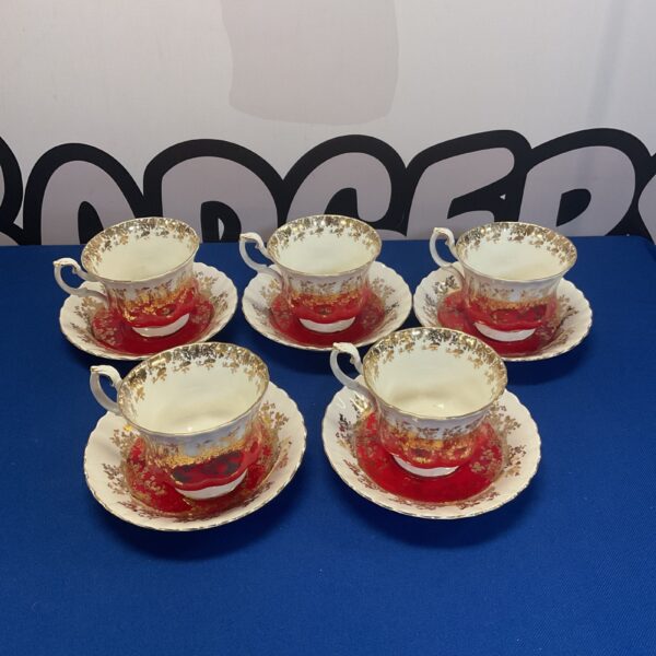 Vintage Royal Albert Regal Series teacup and saucer with floral design.
