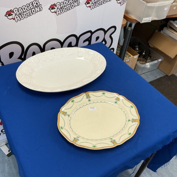 Vintage Royal Doulton meat plates with scenic transferware design.