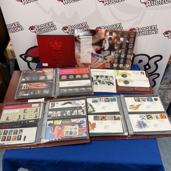 Royal Mail albums with first day covers and 1998 England football memorabilia.