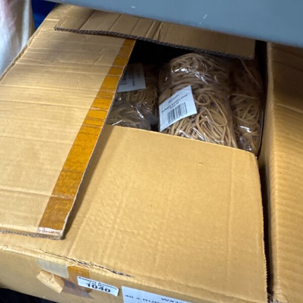 Large quantity of size 32 rubber bands in original packaging.