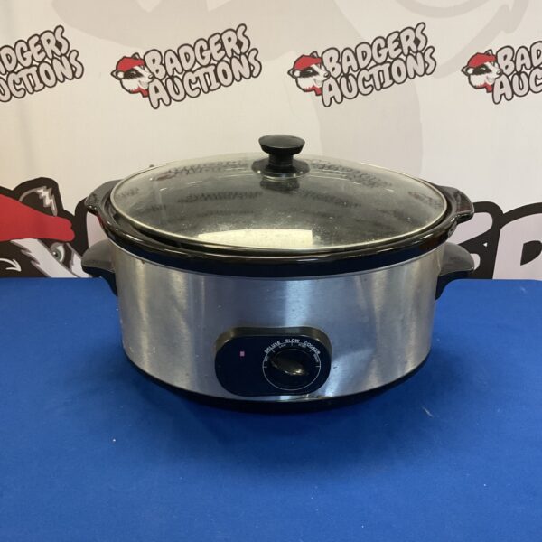 Sainsbury's Deluxe slow cooker with ceramic pot and lid.