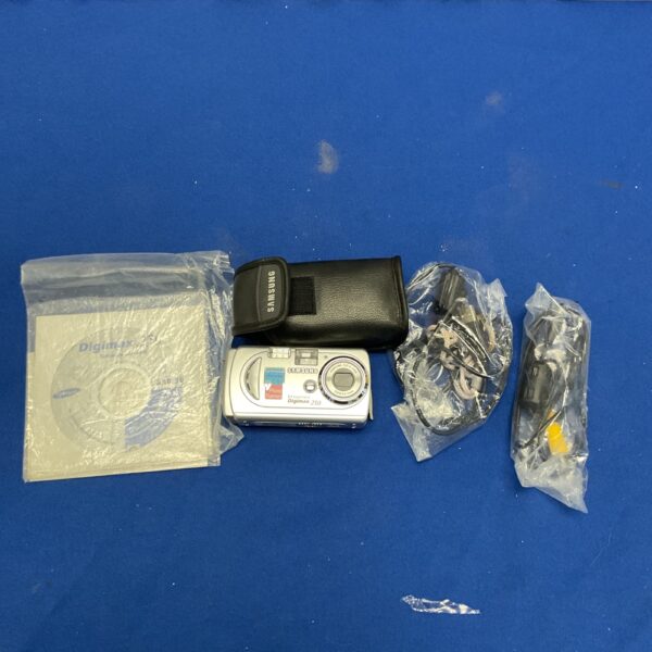 Vintage Samsung Digimax 250 digital camera with strap.