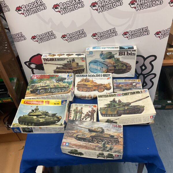 Lot of scale model tank kits including Tamiya and Italeri brands.