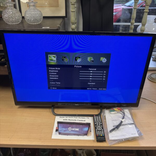 Front view of a Seiki 32 inch flatscreen television.