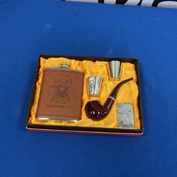 Vintage Shakles of Life pipe and flask set, collectible gentleman's accessory.