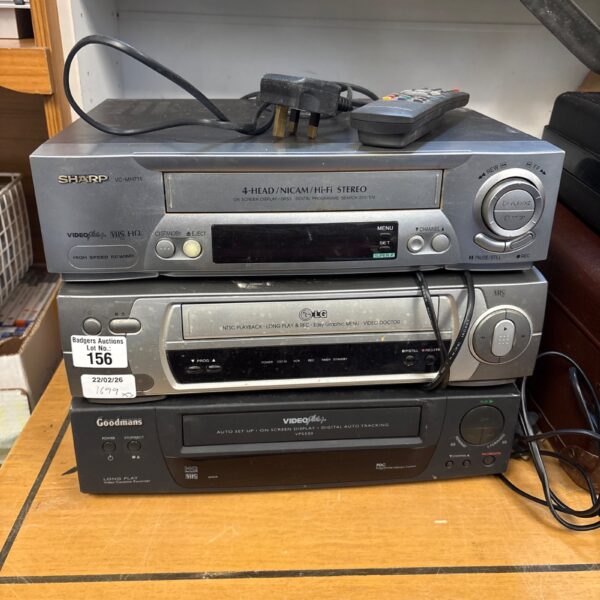 Vintage Sharp VC-MC711 VHS recorder with Goodmans unit.