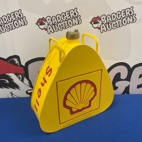 Yellow Shell fuel can with brass cap, vintage style collectible.
