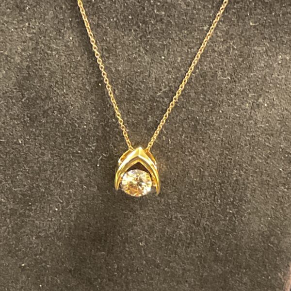 Elegant shimmerstone pendant necklace on silver gilt chain.