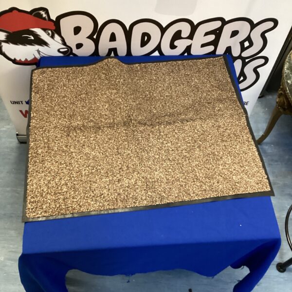 Durable commercial shop door mat for entrance use.