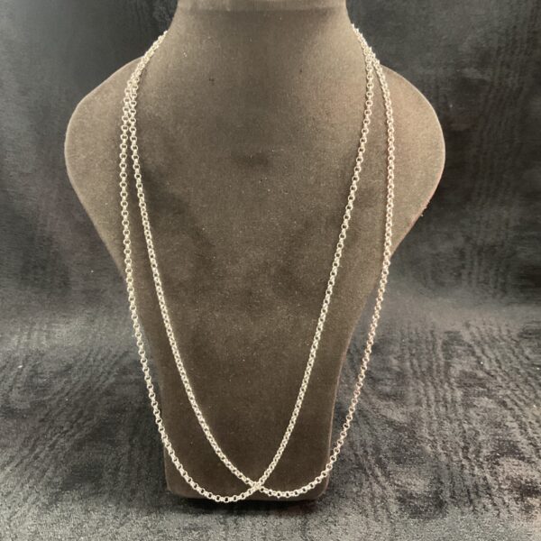 Pair of 925 silver anchor chain necklaces on display.
