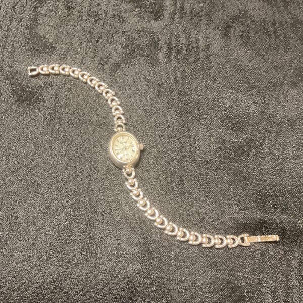 Vintage silver Carvel ladies wristwatch with bracelet strap.