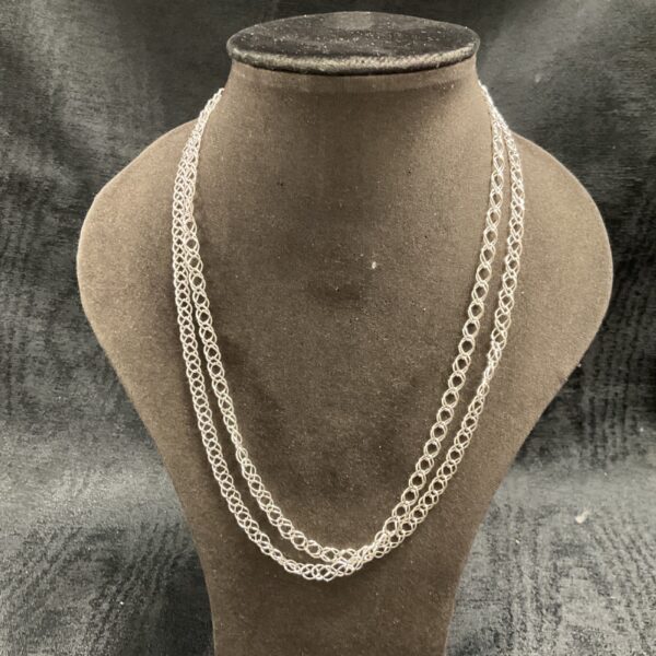 Two 925 silver double link necklaces displayed on a mannequin.