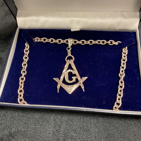 Silver Masonic pendant necklace with square and compass design.