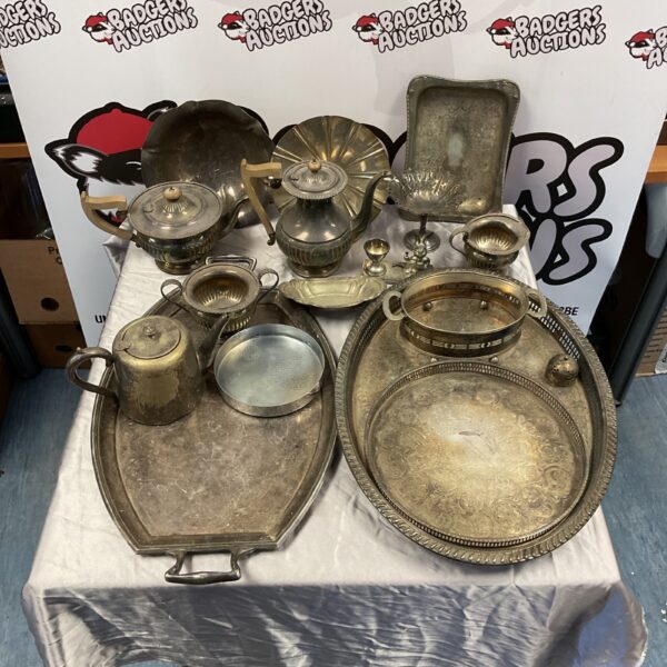 Vintage silver plate serving lot with trays and teapots.