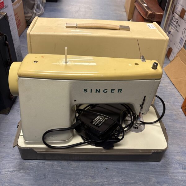 Vintage Singer 457 sewing machine, front view.