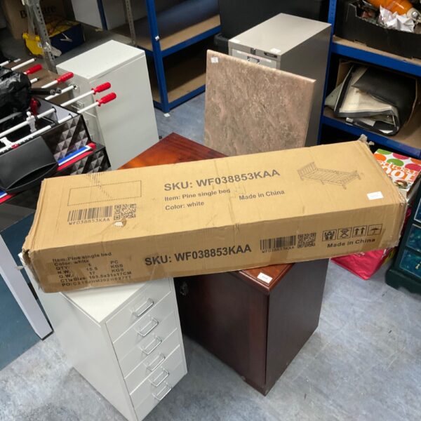 New single pine bed frame in original packaging.