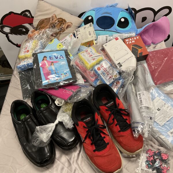 Sketchers size 12 trainers in a mixed lot with cushions and umbrellas.