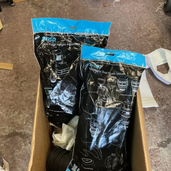 Box of Skylo toilet valves for cistern repair.