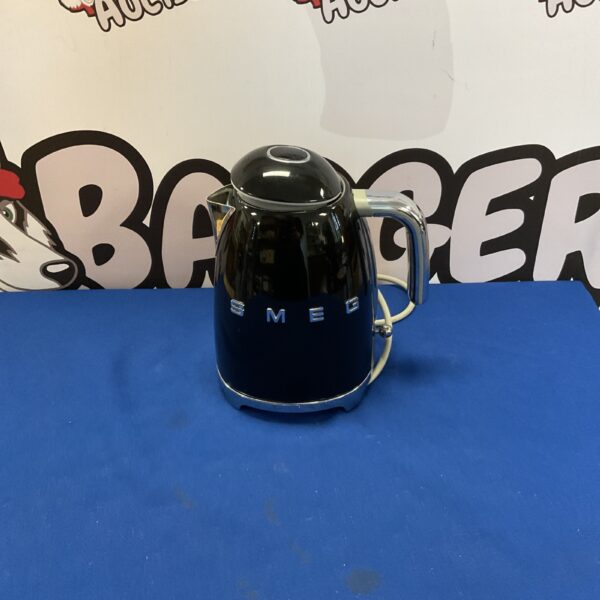 Stylish Smeg electric kettle in stainless steel, retro design.