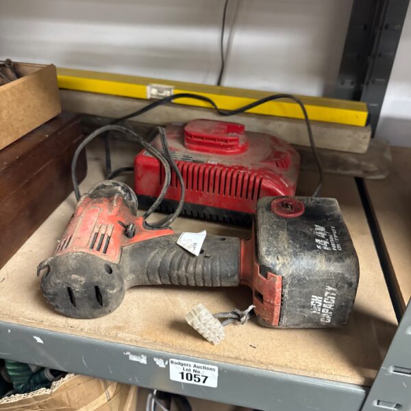 Snap on 3/8” impact driver with battery and charger.