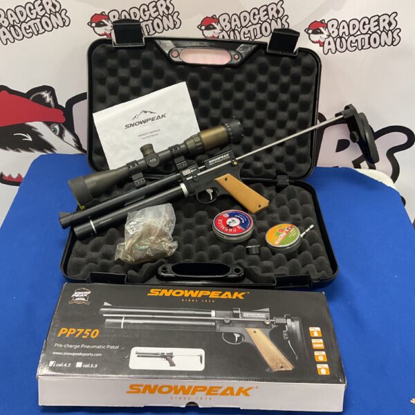 Snowpeak PP750 pistol inside its original storage case with accessories.