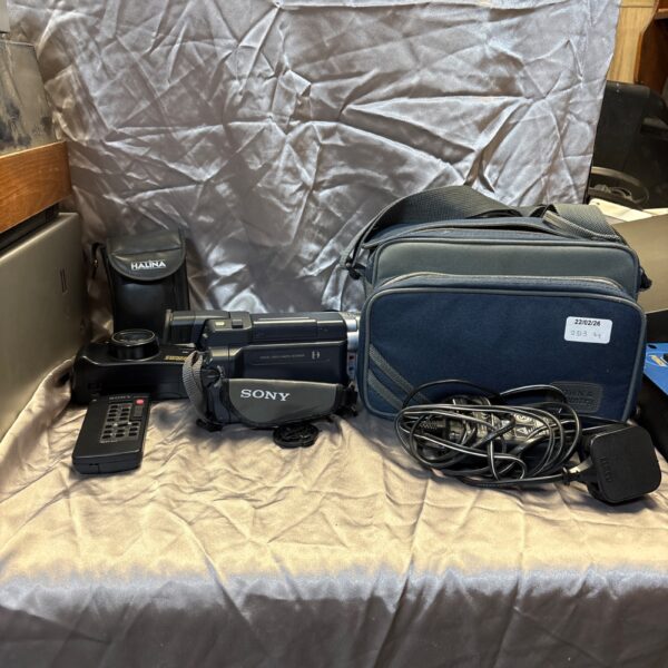 Sony DCR-TRV355E Handycam in carrying bag with accessories.