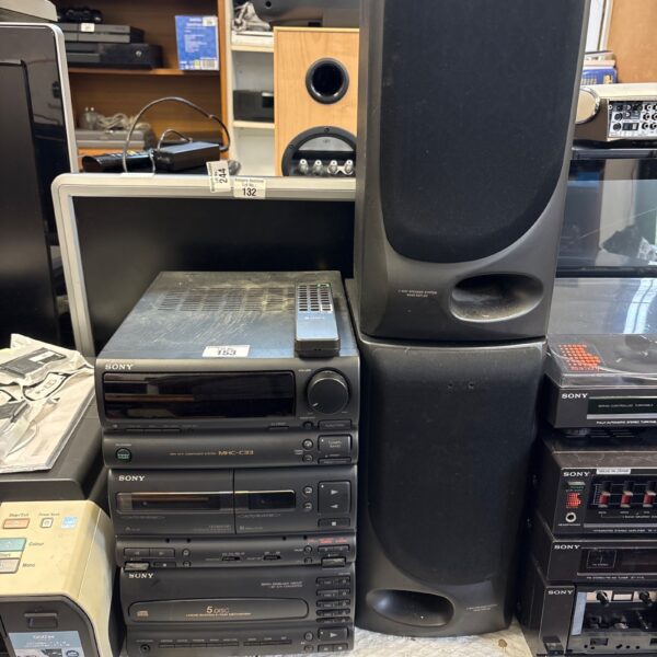 Vintage Sony HCD-C33 stereo system with speakers, classic audio setup.