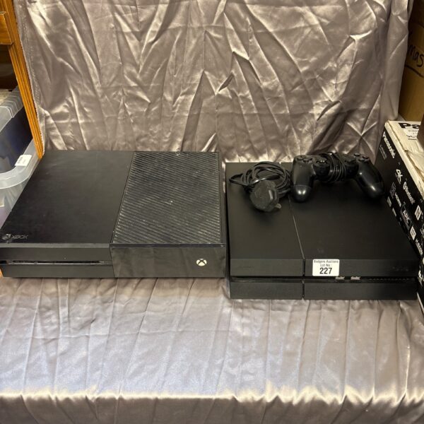 Sony PlayStation 4 console with controller and power supply.