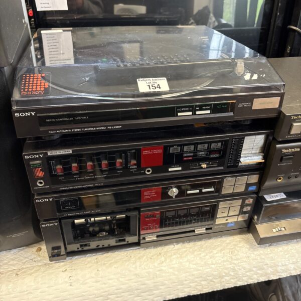 Vintage Sony stereo system with turntable, amplifier, and tuner.