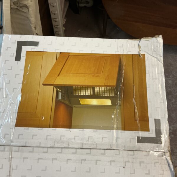 Front view of a stainless steel integrated cooker hood for kitchen ventilation.
