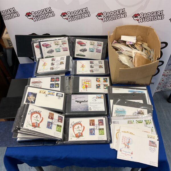 Large stamp collection with first day covers for collectors.