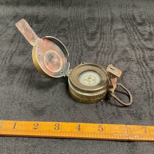Vintage brass Stanley London compass for navigation and collecting.