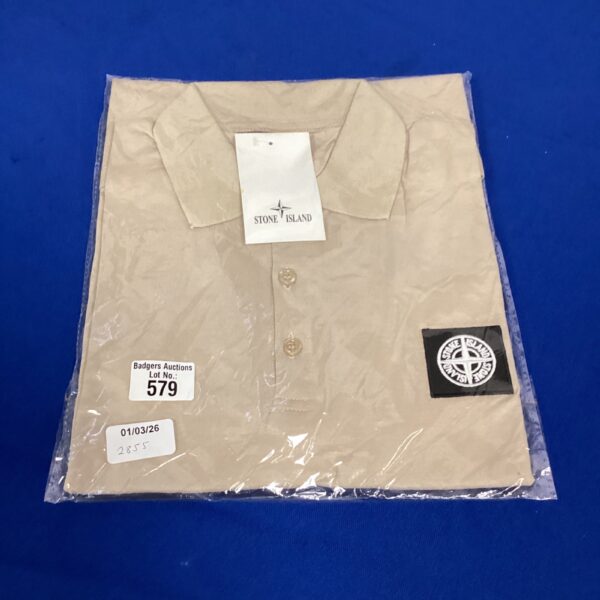 New Stone Island polo shirt size L, sealed and in pristine condition.