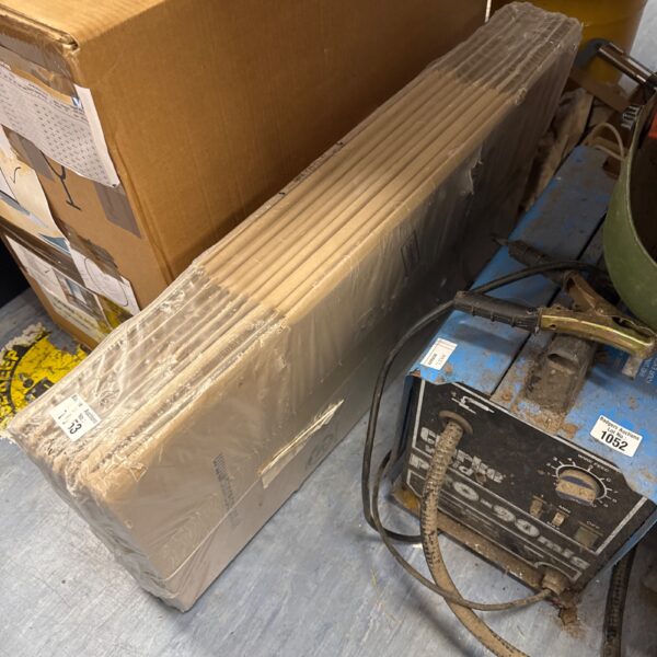 Sealed pack of Storepax medium removals boxes for moving and storage.